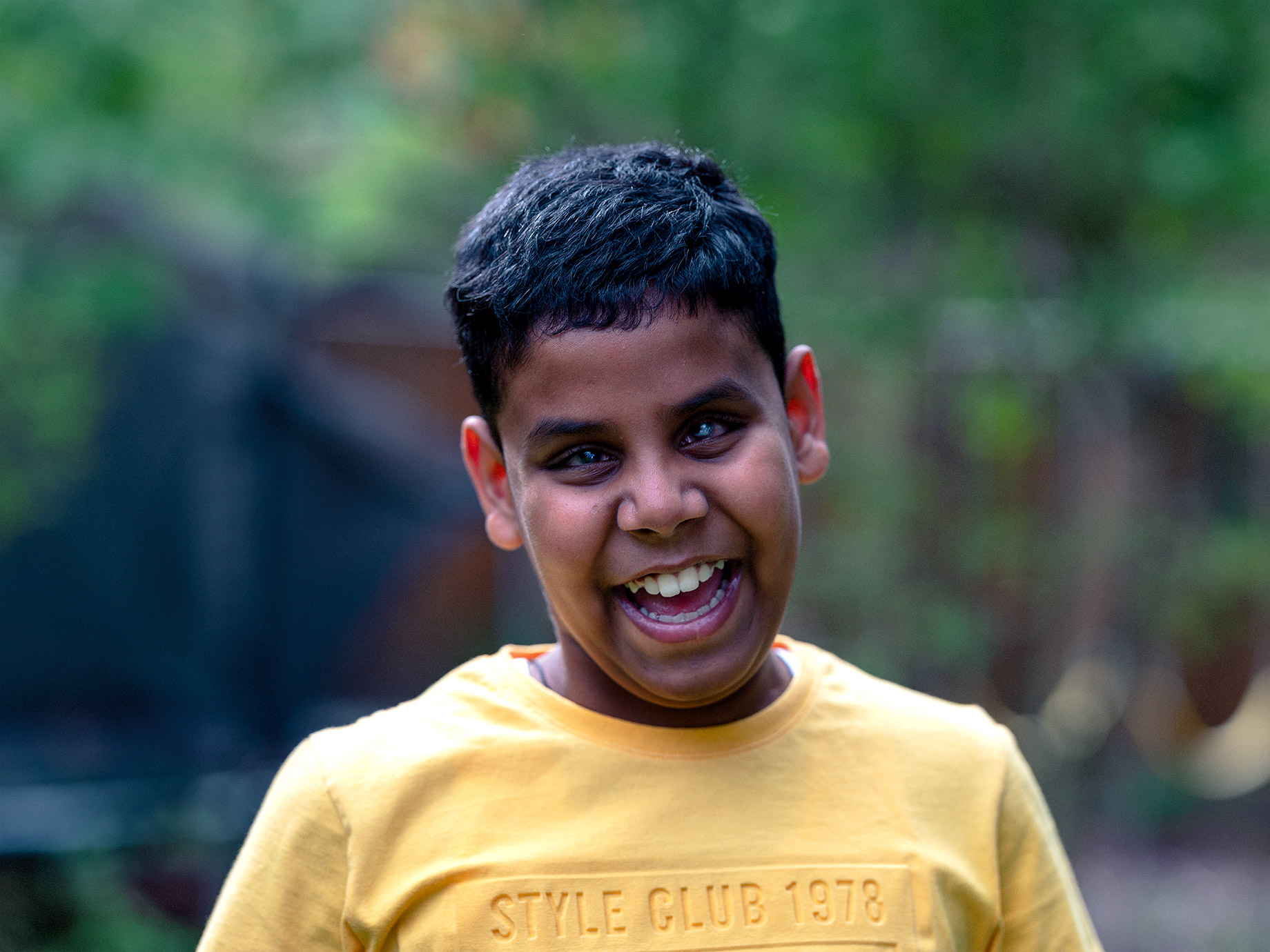 Laughing young boy, Good Boy Wolf Photographer, filmic portrait